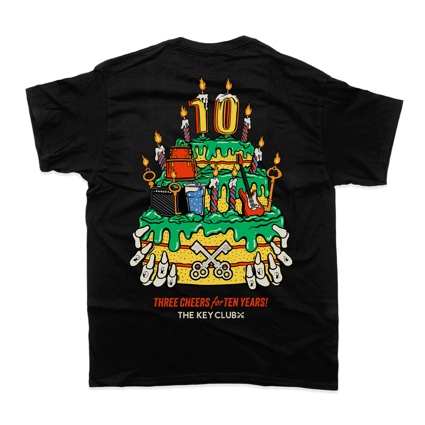 Black t-shirt featuring colorful cartoon cake design for TKC 10th Birthday Limited Edition