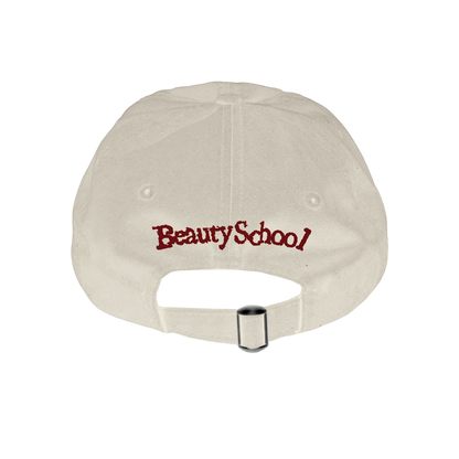 Beige beauty school plane cap with adjustable strap for stylish headwear