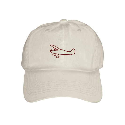 White beauty school plane cap featuring airplane design, perfect for casual wear